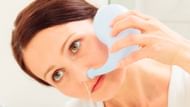 Saline nasal irrigation (Image via Getty Images)